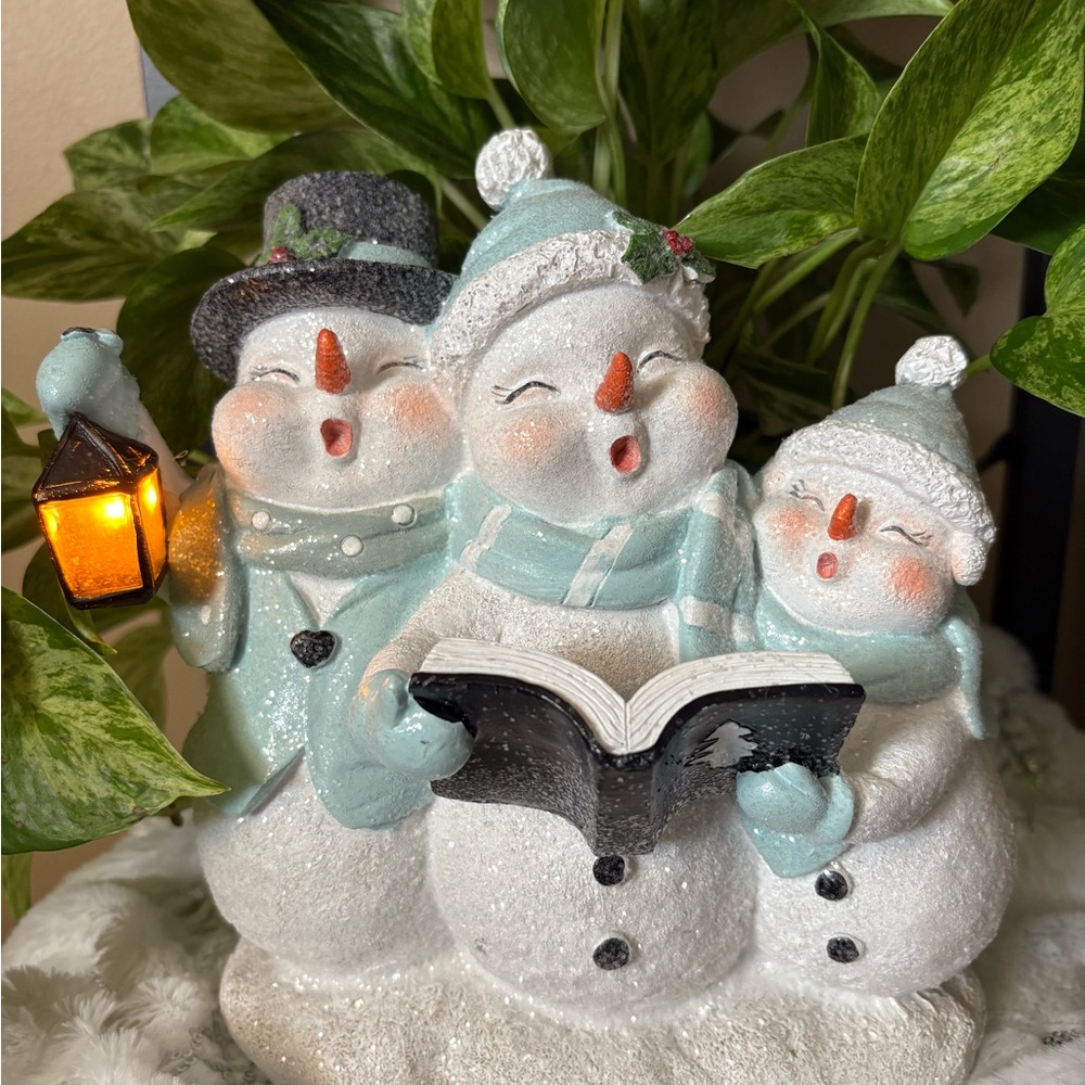 Charming Snowman Family Figurine with Lantern